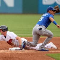 Guardians Player Attempts Steal for NRFI