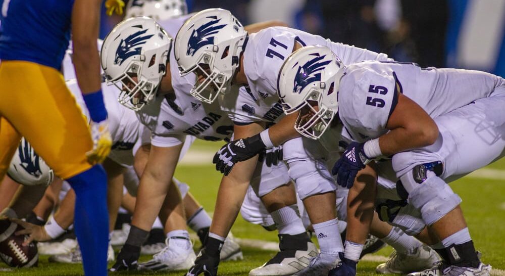 Nevada football offensive line takes position