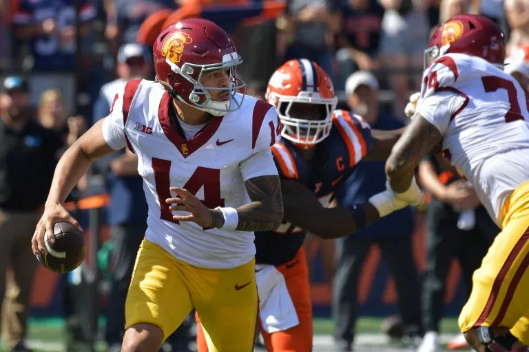 Jayden Maiava looks to lead the Trojans over the Wolverines