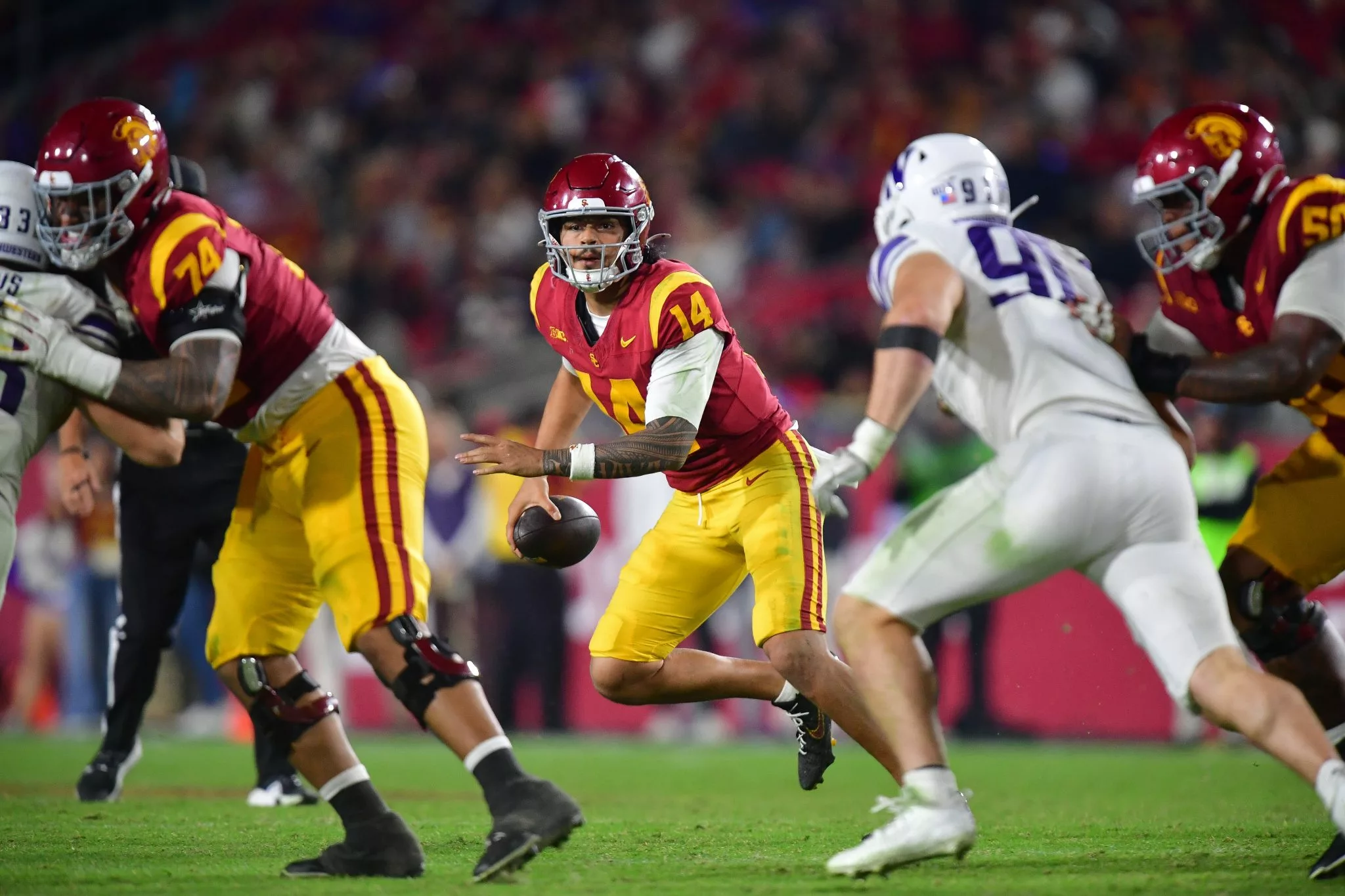Jayden Maiava looks to lead the Trojans over the Hawkeyes
