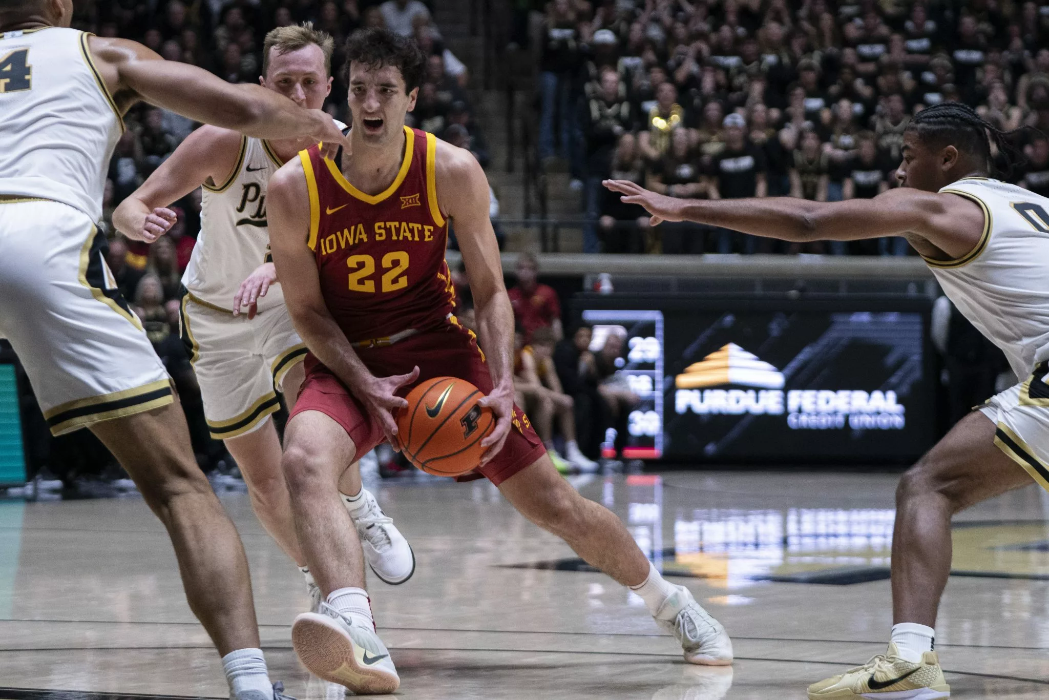 Milan Momcilovic looks to lead the Cyclones over the Hawkeyes